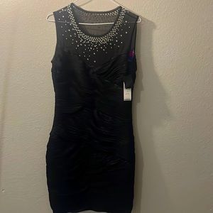 I am selling a beautiful black dress